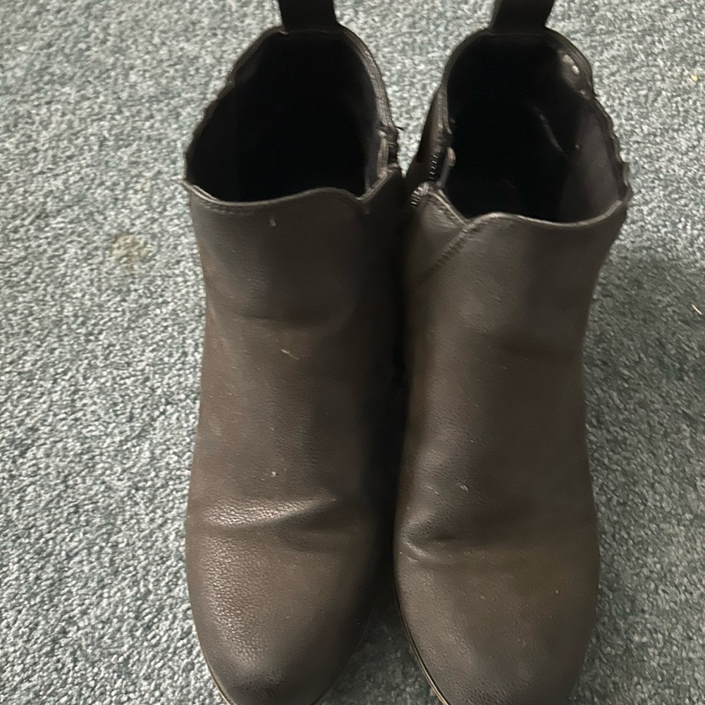 Woman’s black short boots